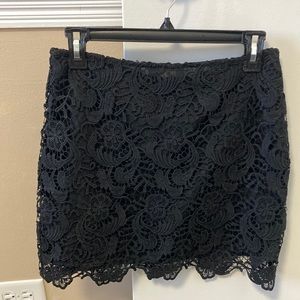 Black lace mini skirt